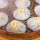 Illustration for article titled The correct way to eat xiao long bao, the worlds most magnificent soup dumplingsem/em